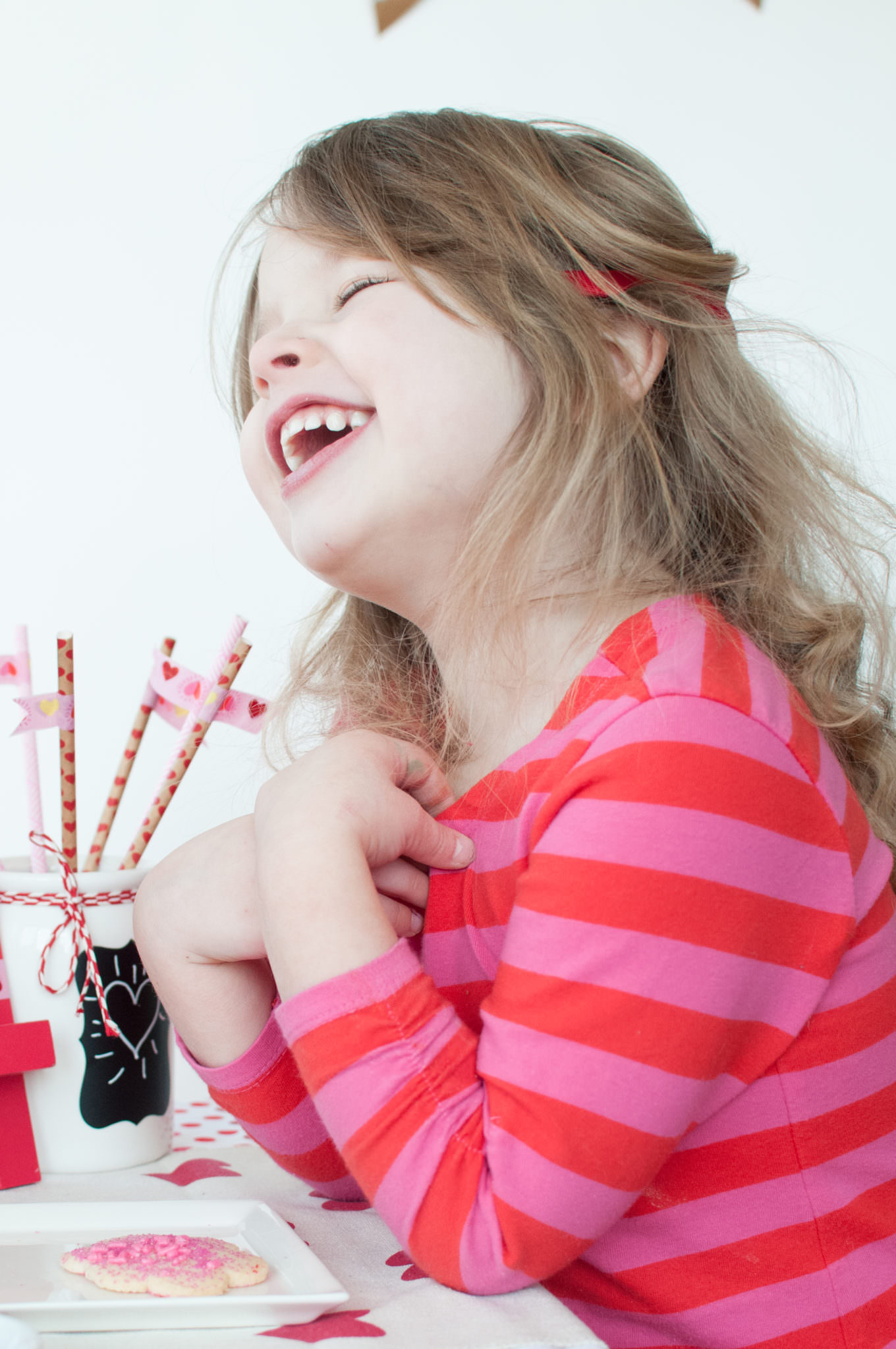 Girl in stripes laughing, Northville Child Photography