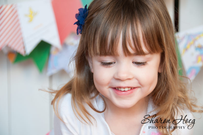 Closeup of a smiling girl, Plymouth MI Child Photographer