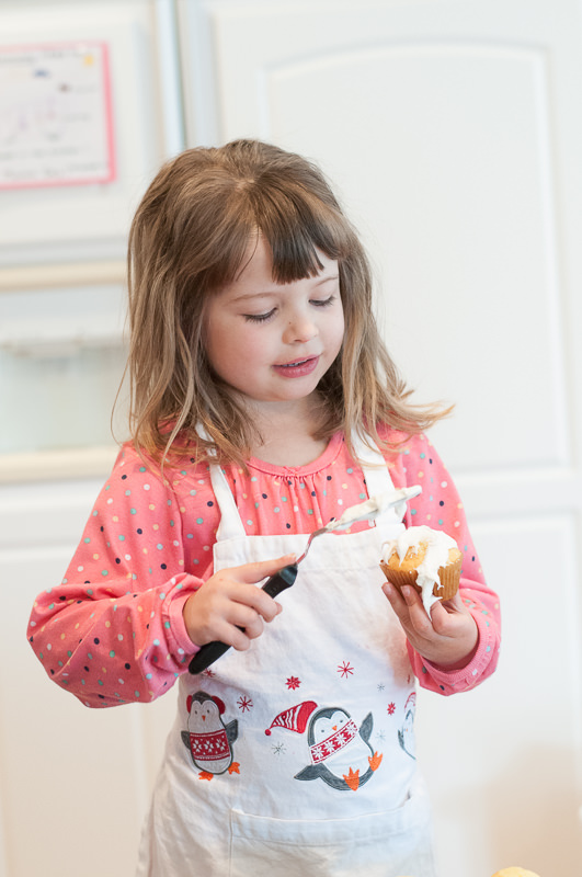 young girl frosting a cupcake, Metro Detroit Child Photographer