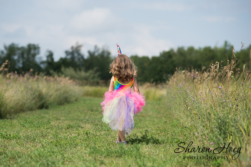 young girl wearing a tutu skirt and leotard, Northville Child Photographer