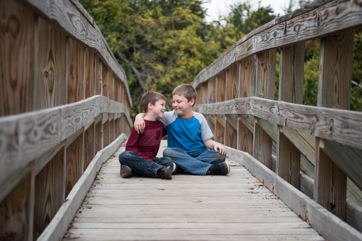 Northville MI Child Photographer, Brothers on a bridge