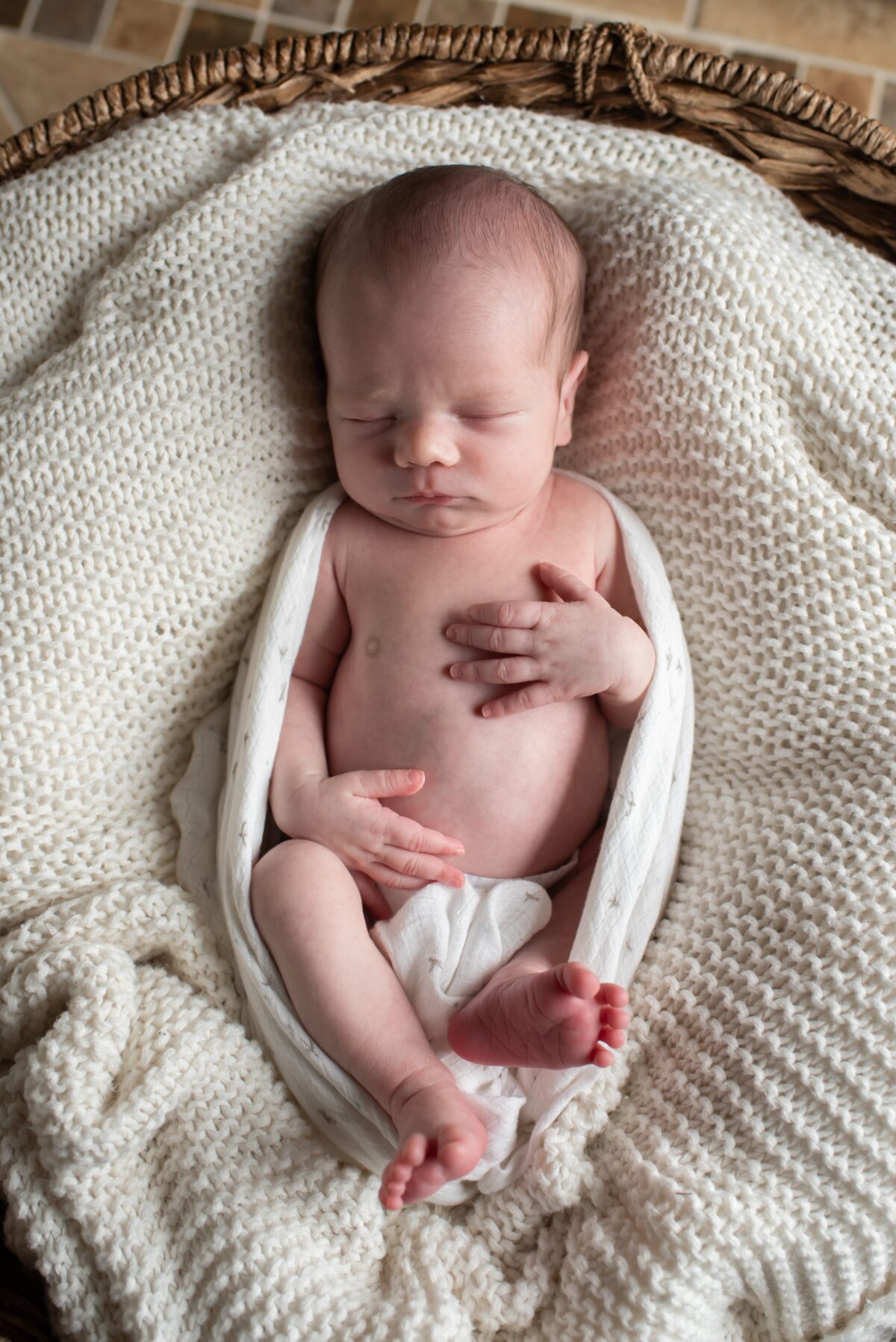 New Baby snuggled in a blanket photography