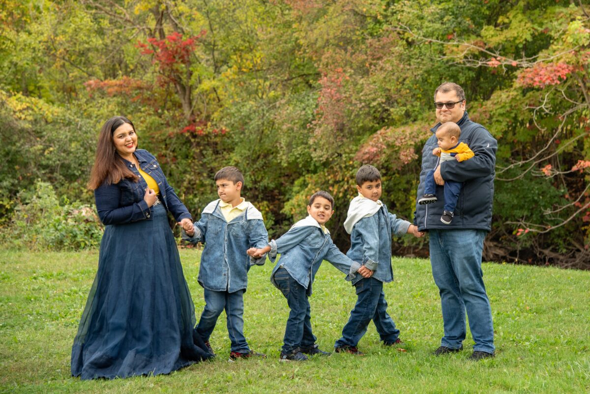 family of all boys having a photo shoot
